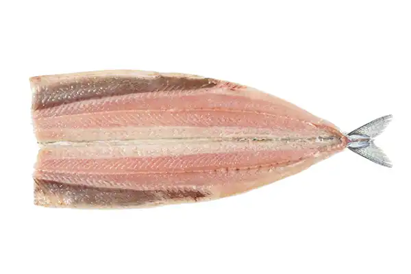 Filleting Pacific saury (sanma) and removing the backbone.